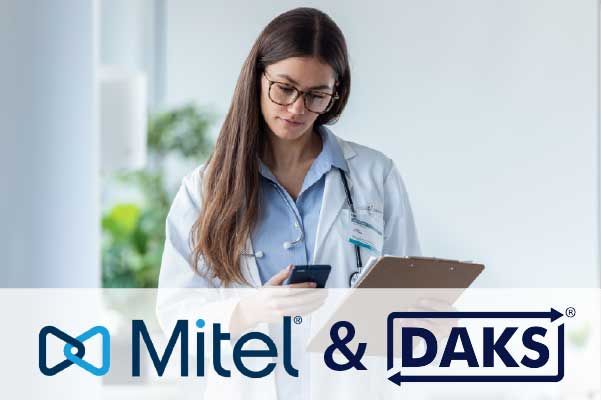 Nurse with cell phone and clipboard, with the Mitel logo and the DAKS logo below